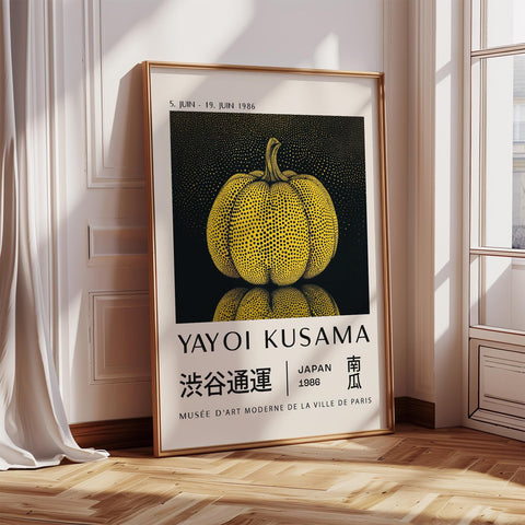 Yayoi Kusama pumpkin artwork with bold yellow and black polka dots.