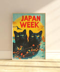 Vintage Japan-inspired poster with bold black cat illustrations.