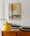 Black lines and yellow circle Bauhaus print.