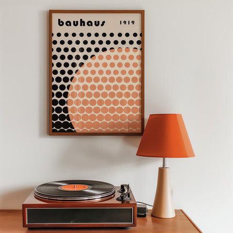 Geometric orange dot pattern wall art.