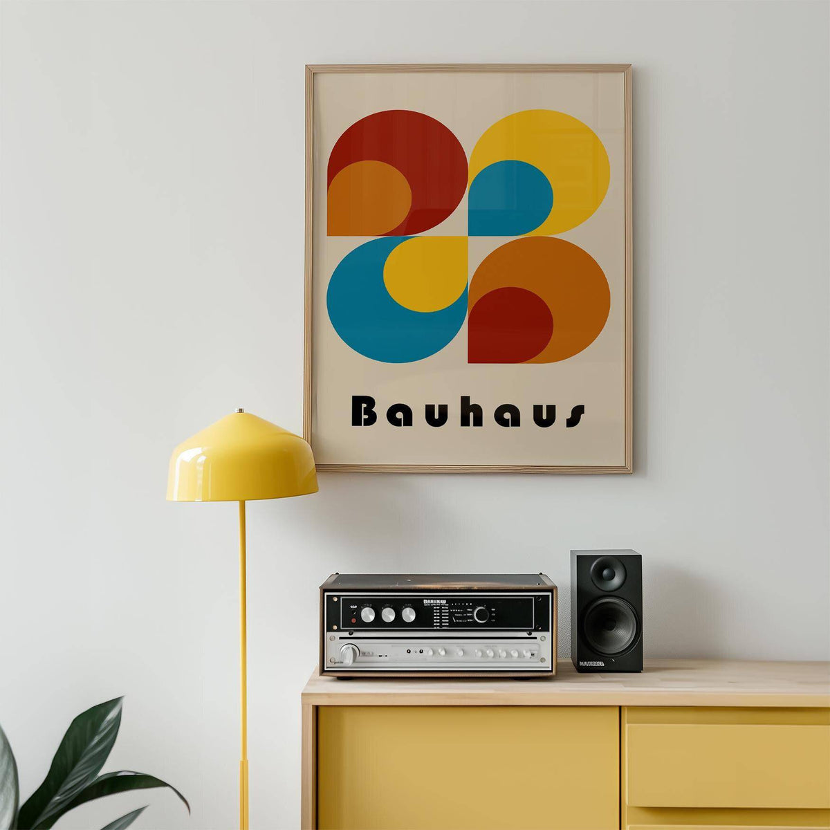 Clean and symmetrical geometric prints hung above a desk