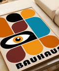 Colourful Bauhaus wall art with geometric eye design.