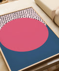 Bold geometric wall art with pink and blue polka dot sunset