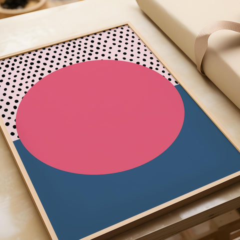 Bold geometric wall art with pink and blue polka dot sunset