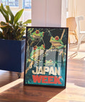 Bold Japan Week frog poster with colorful animal art.