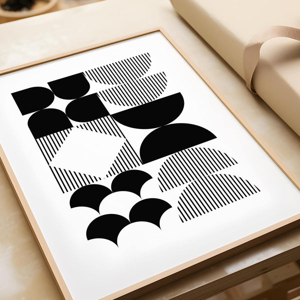 Black and white geometric wall art with sharp angular forms