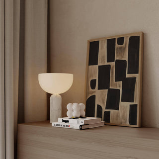 Modern bedroom styled with neutral-toned wabi sabi artwork