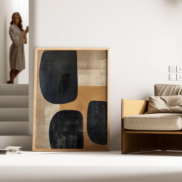 Earthy wall art with warm beige and black abstract elements