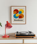 Minimalist red, yellow, and blue circles Bauhaus poster.