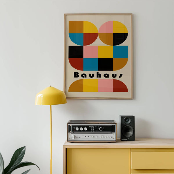Abstract Bauhaus-style colorful geometric wall art in a minimalist living room