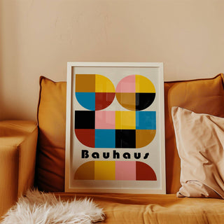 Color-blocked colorful geometric wall art used in a stylish reading nook