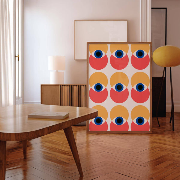 Geometric wall art eye with central gaze styled in a hallway gallery wall