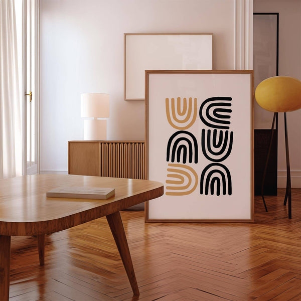 Organic-shaped black and gold pictures ideal for elegant interior styling