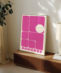 Bold geometric shapes in pink Bauhaus poster