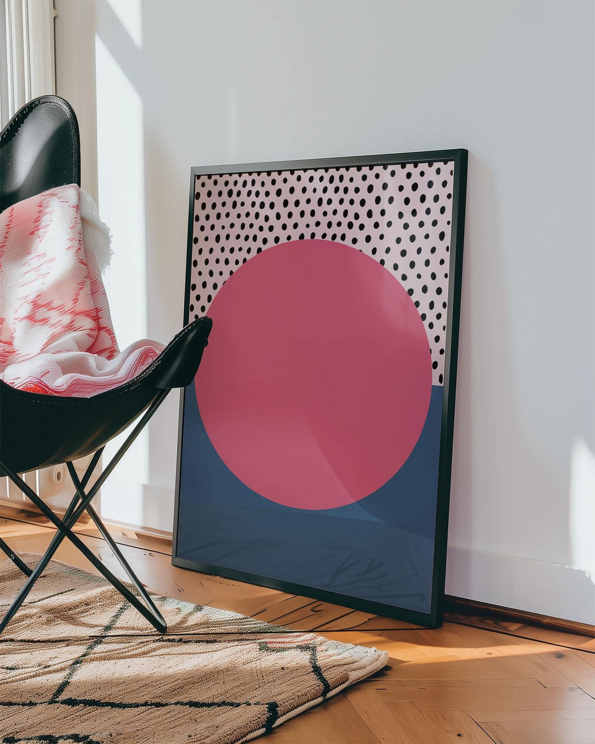 Graphic pink and blue modern abstract art geometric piece in a reading nook