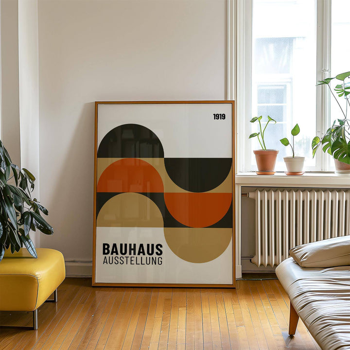 Artwork for the Wall print leaning on a wooden floor with plants and sofa in a living room