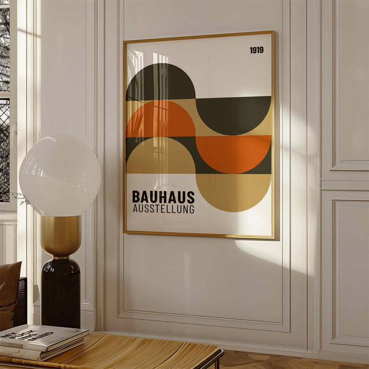 Artwork for the Wall framed print of abstract geometric shapes in earthy tones with a lamp nearby