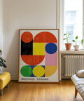 Abstract red, yellow, and blue geometric print inspired by Bauhaus design