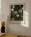 Green botanical wall art with dandelions and nature motifs