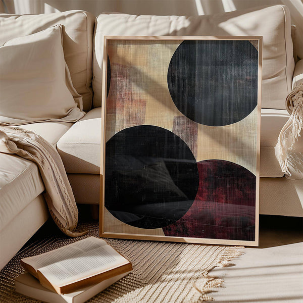 Abstract neutral art featuring bold black and red circles
