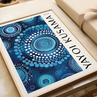 Close-up of swirling details in blue mandala wall art