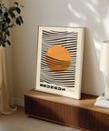 Op art wall print with orange and black contrast