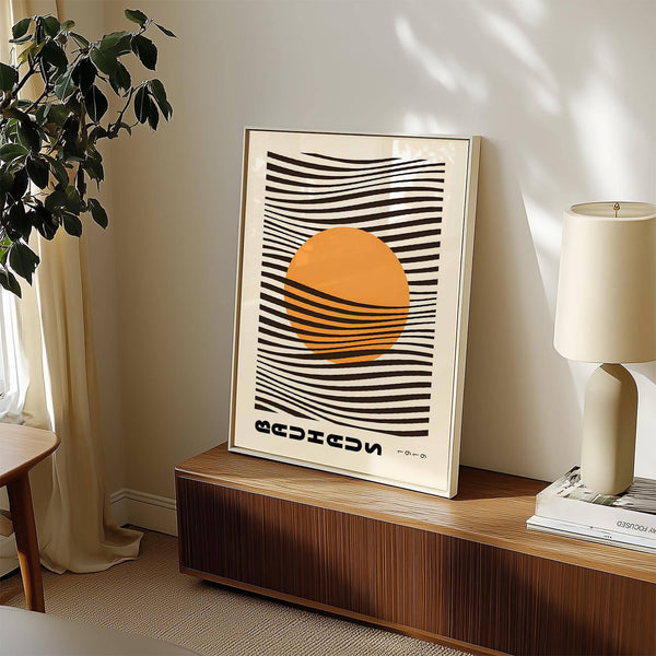 Contemporary home decor with black and orange bauhaus print wall piece