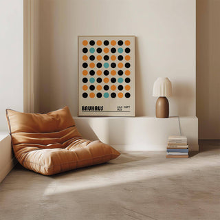 Living room featuring geometric wall decor with mid-century vibes