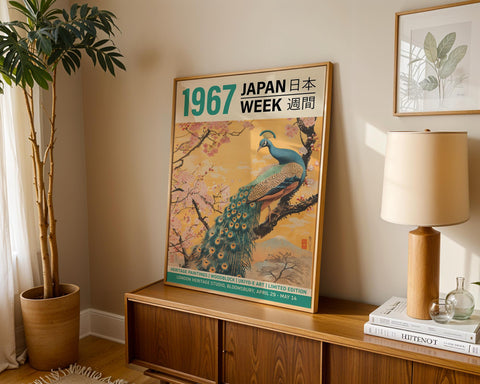 Japanese heritage art poster with a golden sky, peacock, and cherry blossoms.