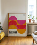 Modern Bauhaus poster with bold pink and orange design