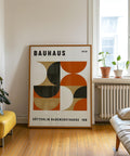 Retro Bauhaus wall art with warm orange and gold shapes