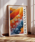 Yayoi Kusama-inspired abstract landscape poster in orange, blue, and yellow tones