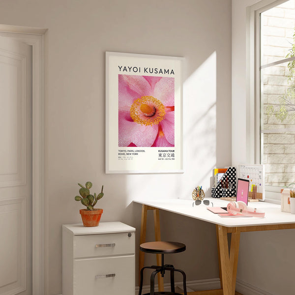 Colourful floral details featured on abstract pink wall art piece