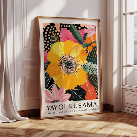 Yellow floral wall art with vibrant petals and tropical leaves