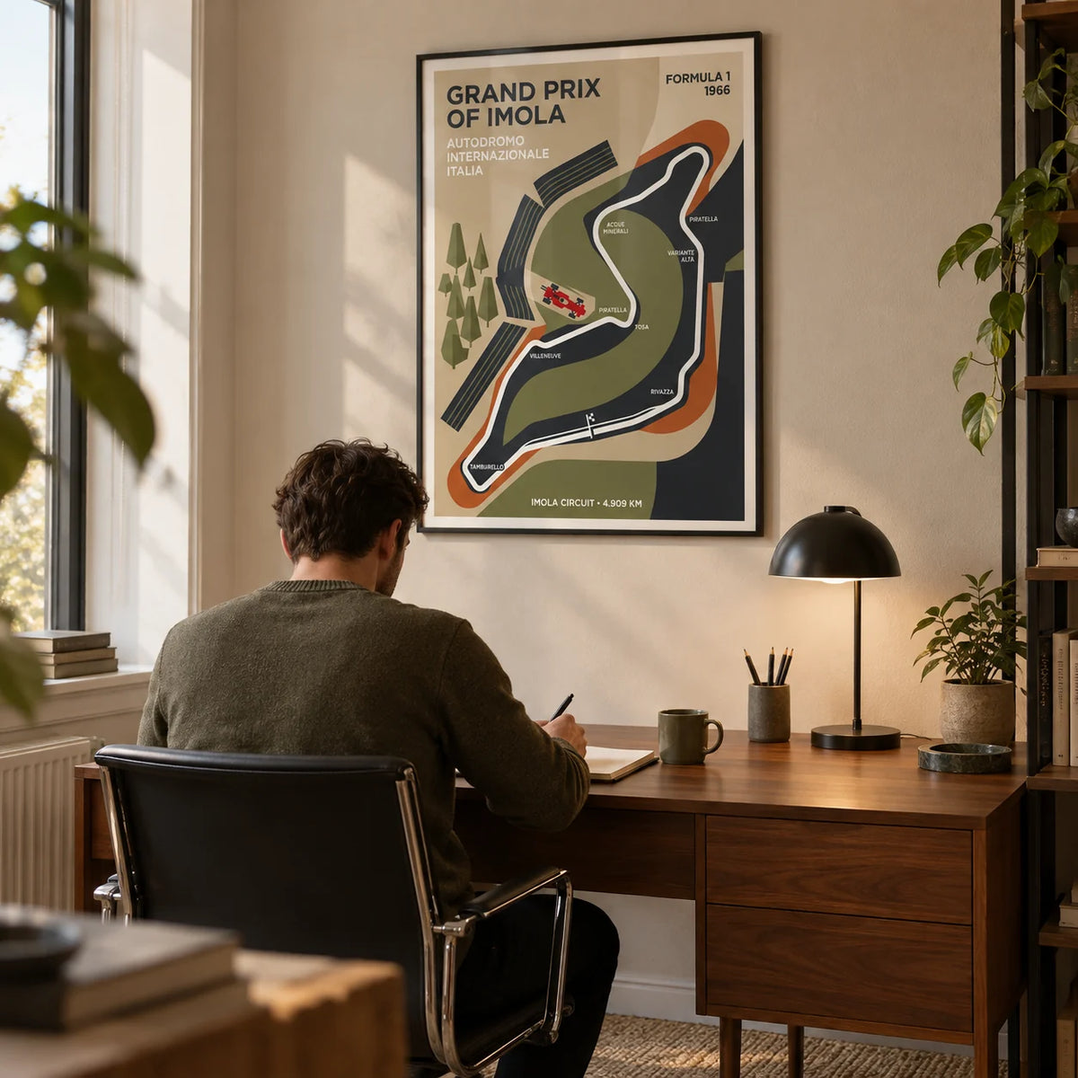 Imola Circuit Map Poster, framed on the wall of a modern home office with a beige wall
