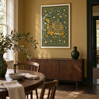 Indian Style Turtle Poster, framed on the wall of a characterful dining room in a UK townhouse with muted ochre walls and dark timber flooring