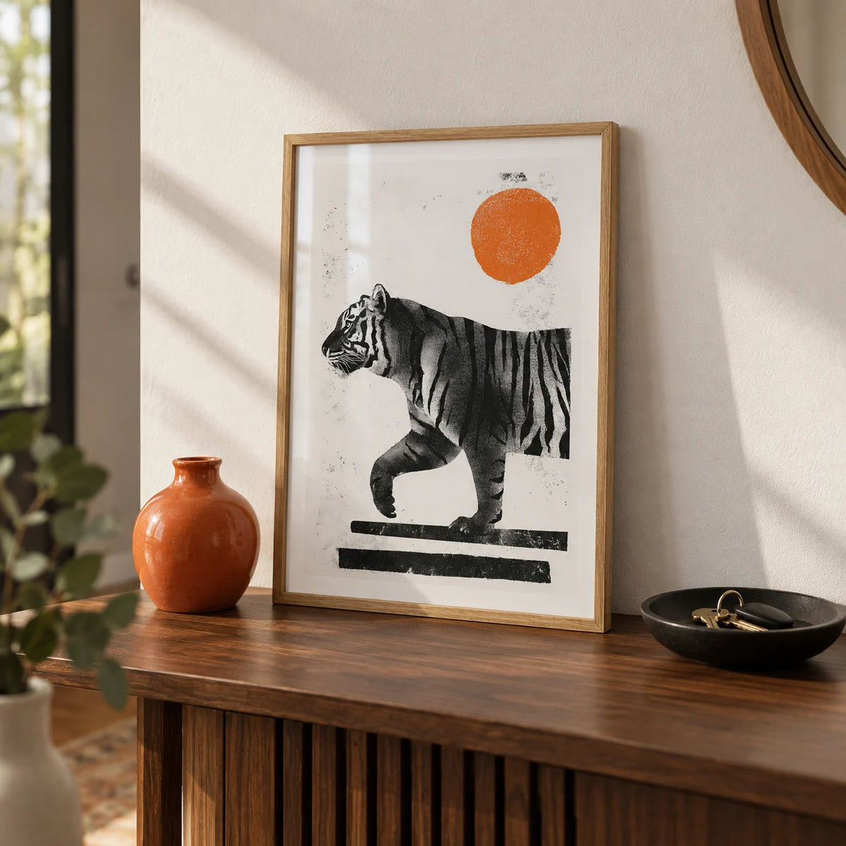 Indian Tiger Print, a small A4 framed print leaning on a walnut hallway side table
