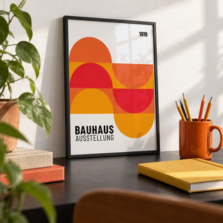 Inexpensive Artwork, a small A4 framed print leaning on a black desk