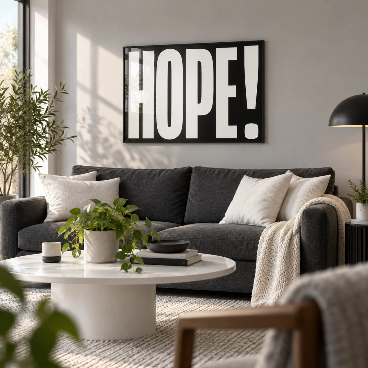Inspirational Artwork, framed on the wall of a modern living room with a light grey wall