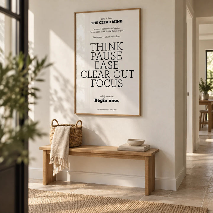 Inspirational Quotes for Office Wall, framed on the wall of a calm hallway with a white wall and a pale stone floor