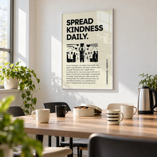 Inspirational Quotes Posters, framed on the wall of a bright community centre staff room with a white wall