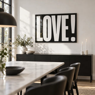 Inspired Posters, framed on the wall of a modern dining room with a white wall