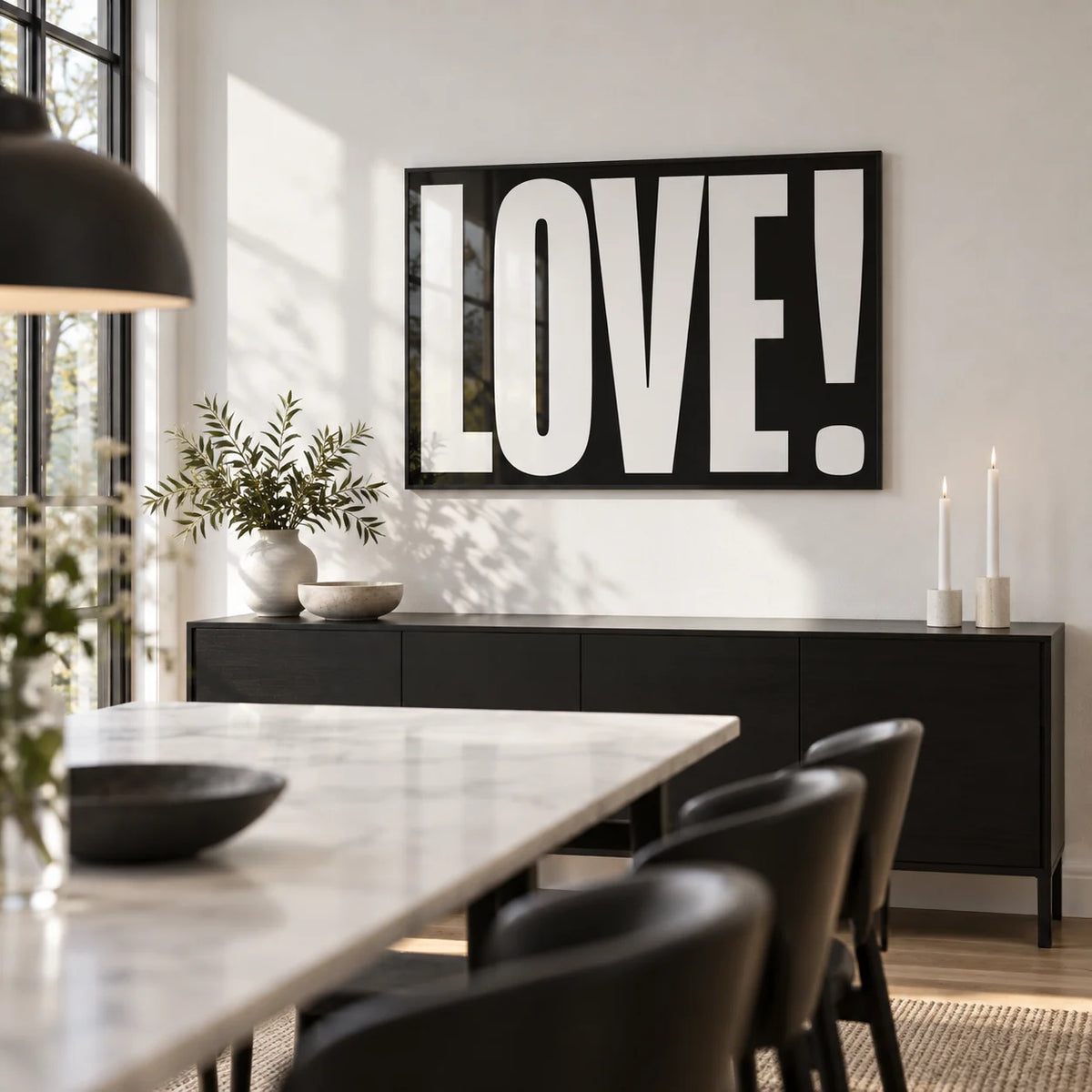Inspired Posters, framed on the wall of a modern dining room with a white wall