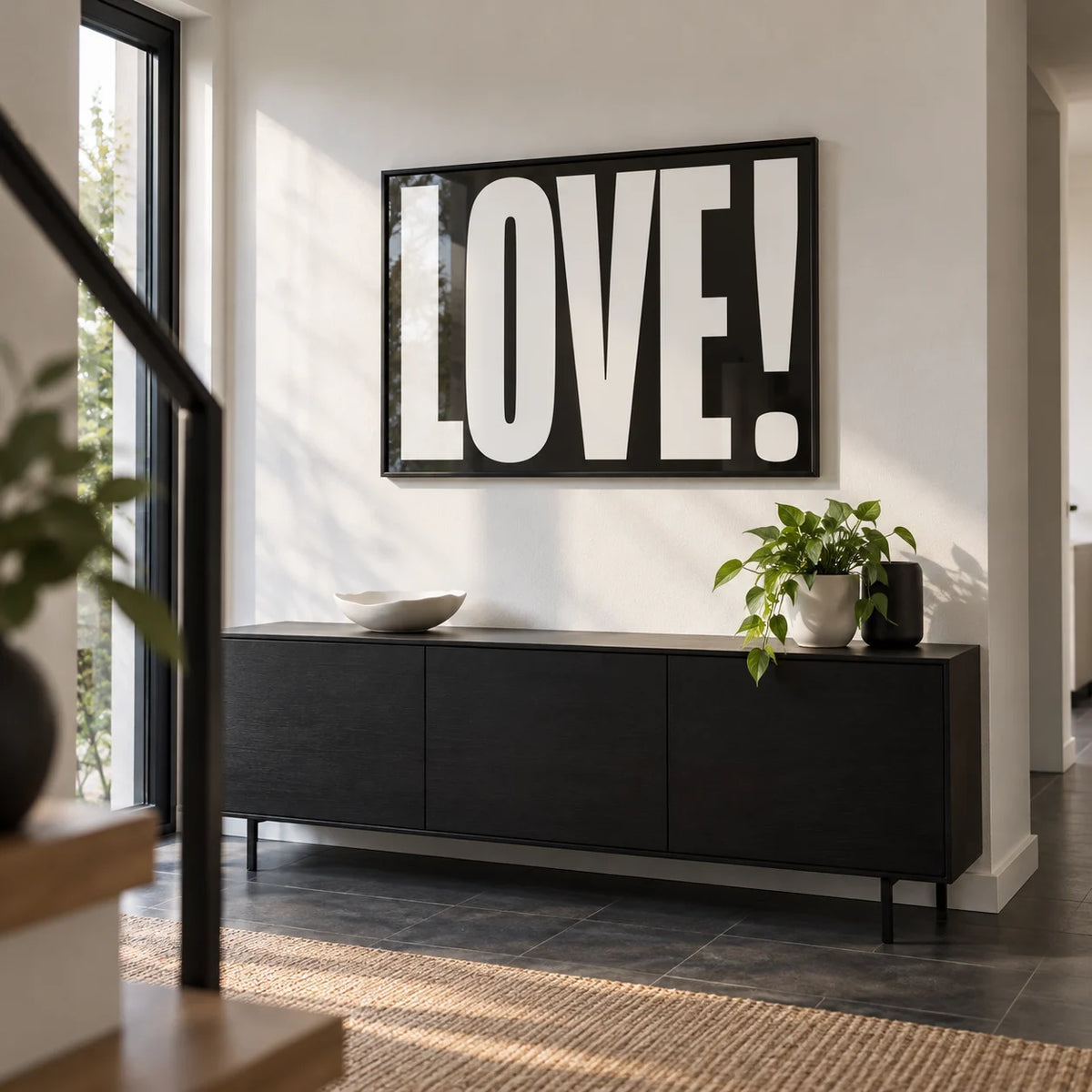 Inspired Posters, framed on the wall of a modern hallway with a white wall and a dark floor