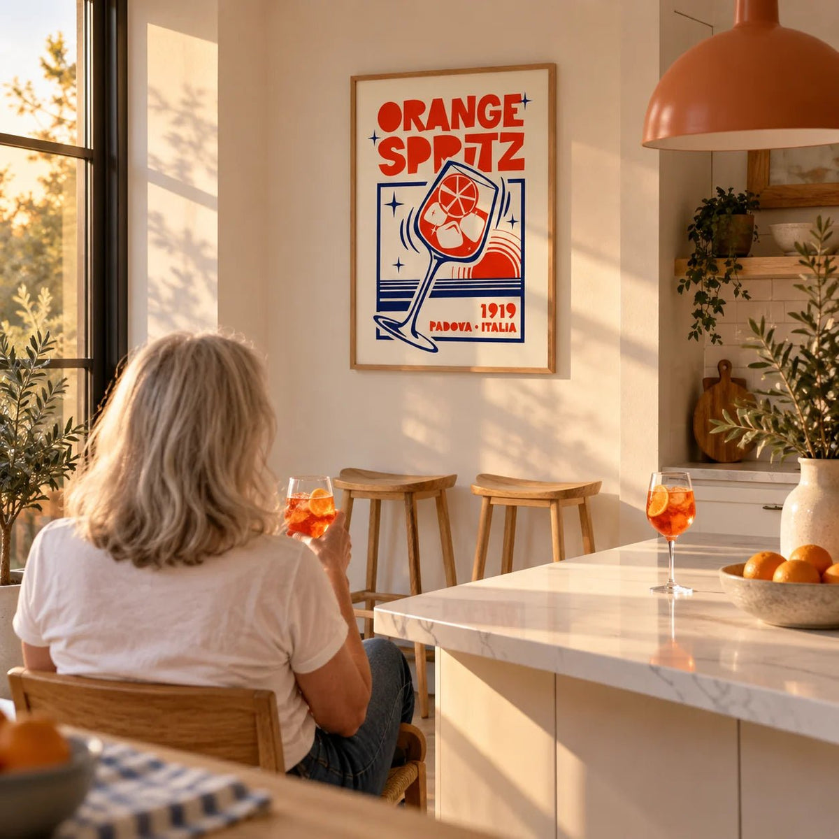 Italian Cocktail Art Print, framed on the wall of a open kitchen with an island