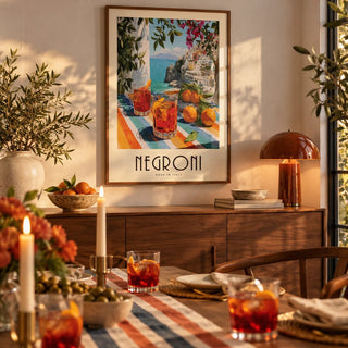 Italian Drink Posters, framed on the wall of a dining room set for dinner