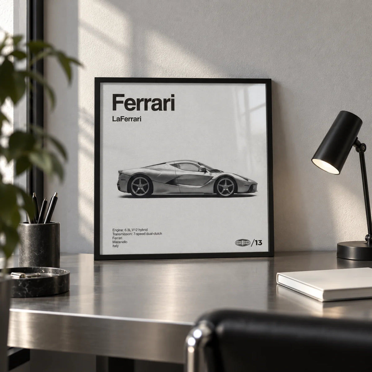 Italian Hybrid Hypercar Poster, a small A4 framed print leaning on a brushed metal desk