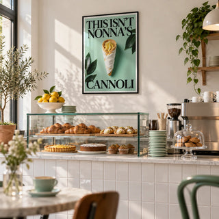 Italian Kitchen Art, framed on the wall of a small modern Italian bakery cafe with a white tiled counter front and a plain white wall