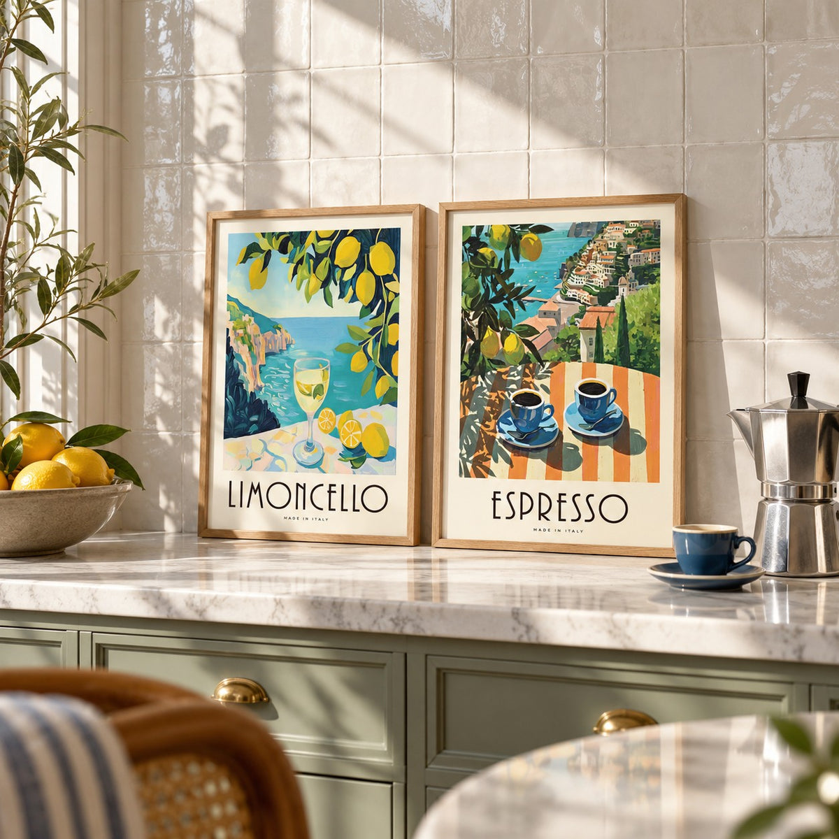 Italian Kitchen Prints Set of 2 styled as small A4 prints on a shelf, to show the gift size: Amalfi Limoncello and Amalfi Espresso shown framed side by side (frames not included)
