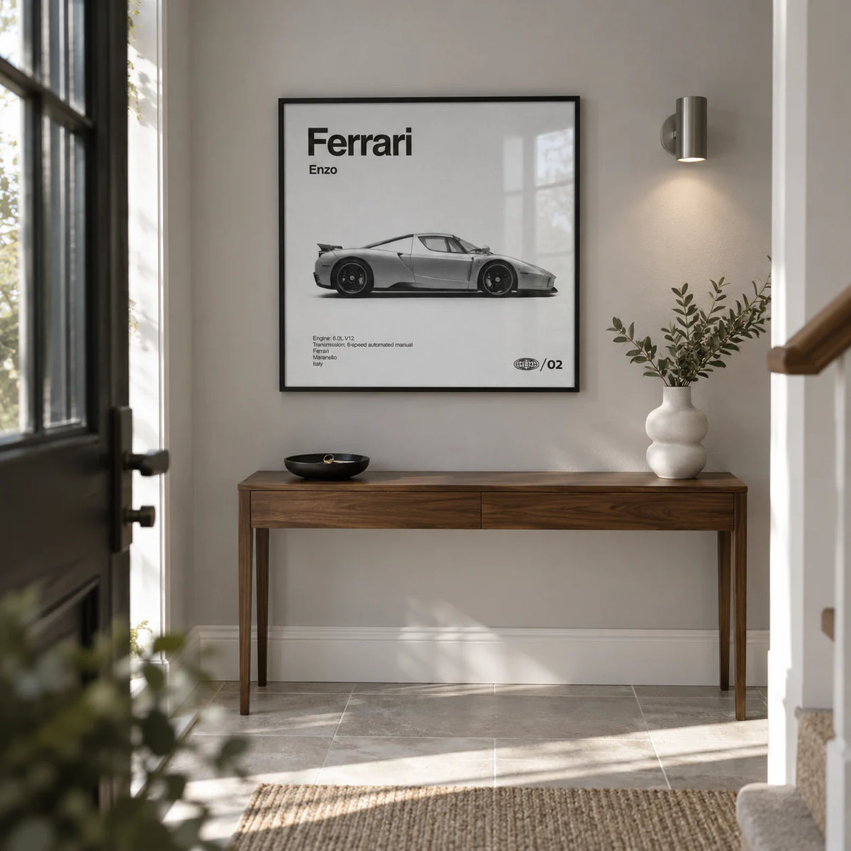 Italian Supercar Art Print, framed on the wall of a crisp entrance hallway in a renovated UK semi-detached house with a light grey wall and large plain stone floor tiles
